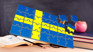 Swedish flag puzzle pieces in front of a classroom